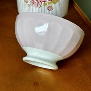 Old faceted bowl in pink earthenware