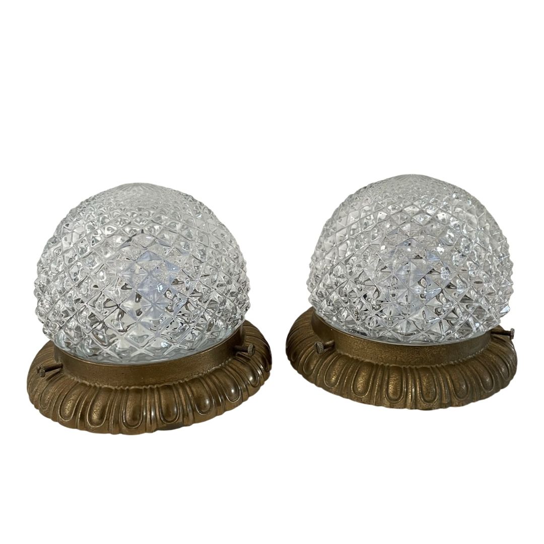 Set of two ceiling lamps or sconces in brass and glass