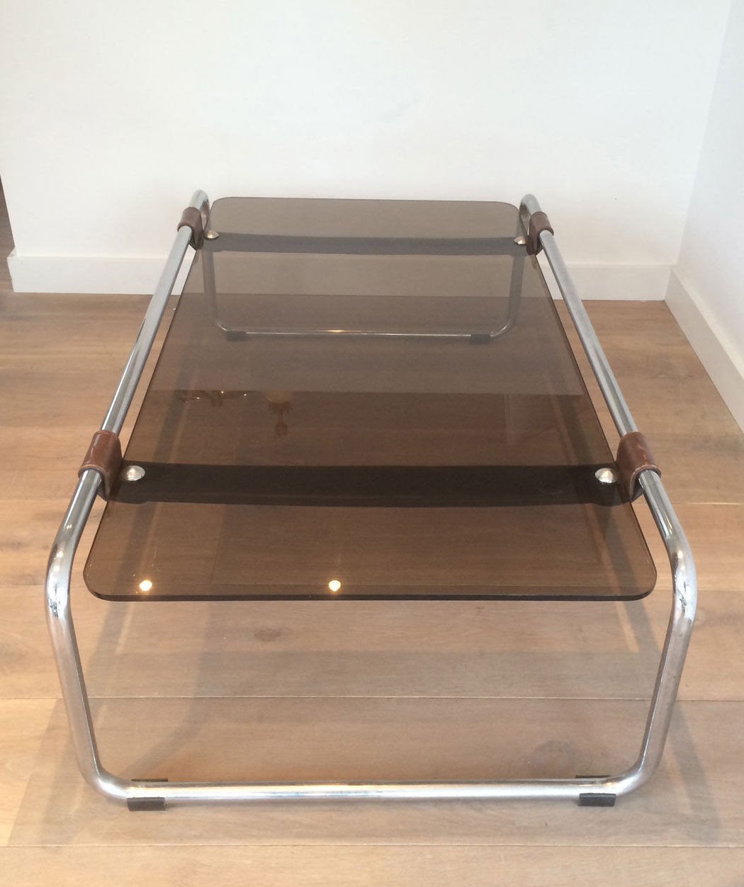 Coffee table in chrome, leather and smoked glass