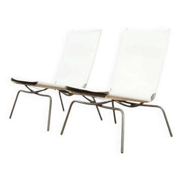 Ensemble de 2 fauteuils lounge Crossed legged par Fabiaan van Severen.