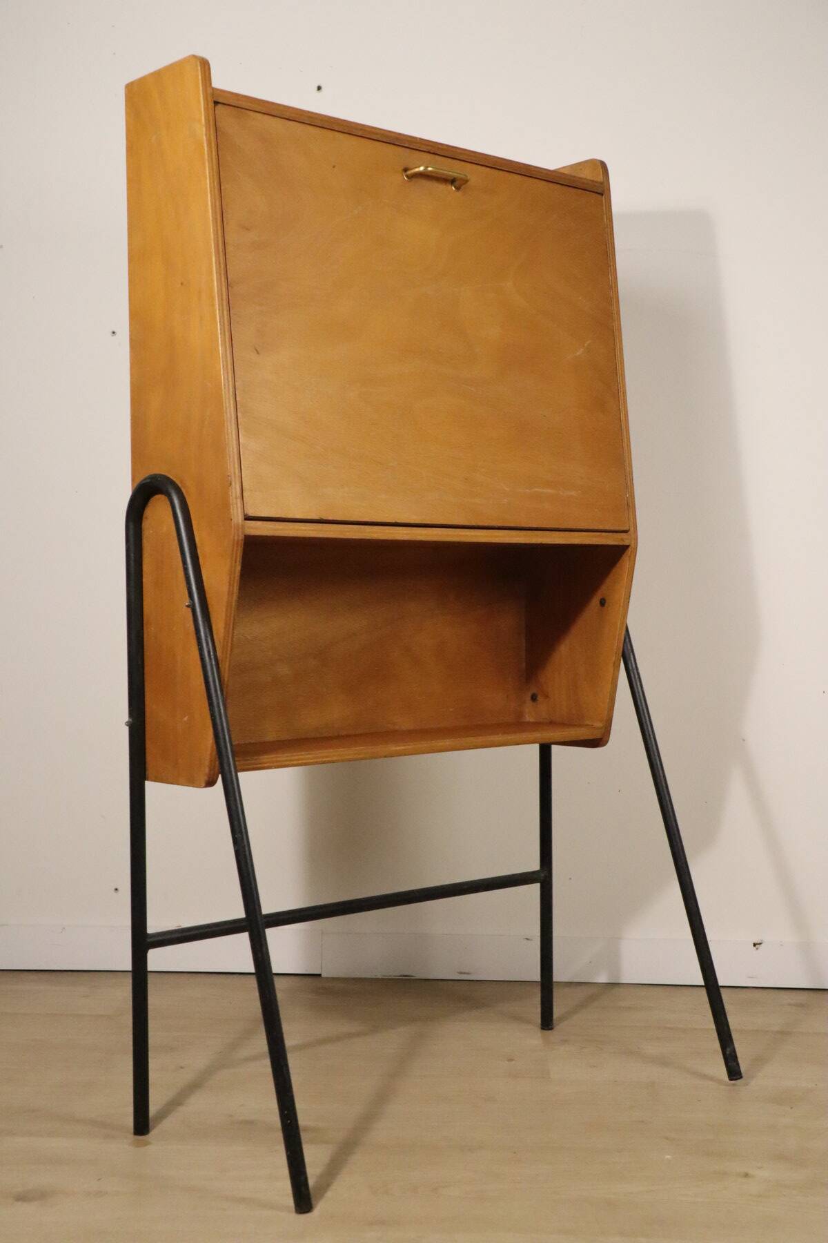 Vintage 1960s wooden secretary with metal legs.