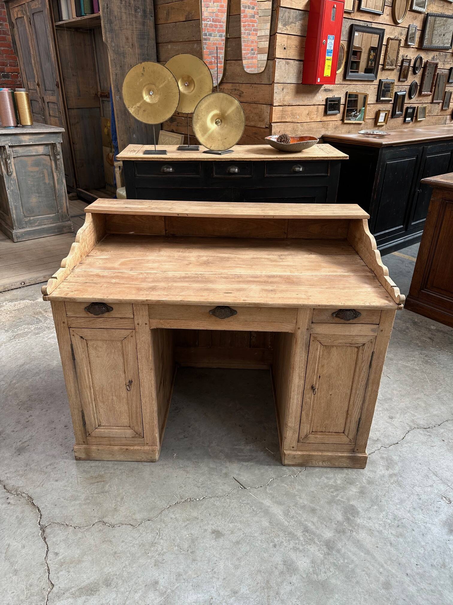 Solid oak reception desk, early 20th century