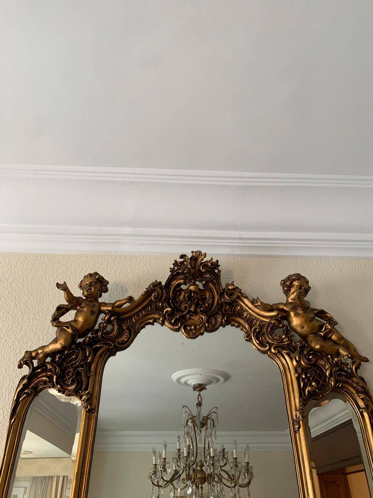 Golden Rococo-style mirror with chest