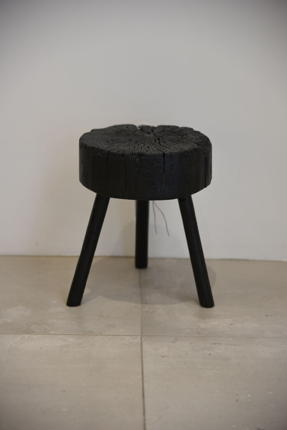 Stool wood finishing shou-sugi-ban in wood burned with treatment