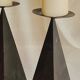 Pair of pyramid-shaped candlesticks in blackened metal (brutalism)