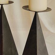 Pair of pyramid-shaped candlesticks in blackened metal (brutalism)