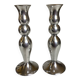 Pair of silver metal candlesticks