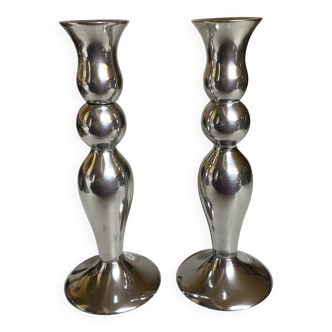 Pair of silver metal candlesticks