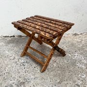 Small folding stool in exotic wood