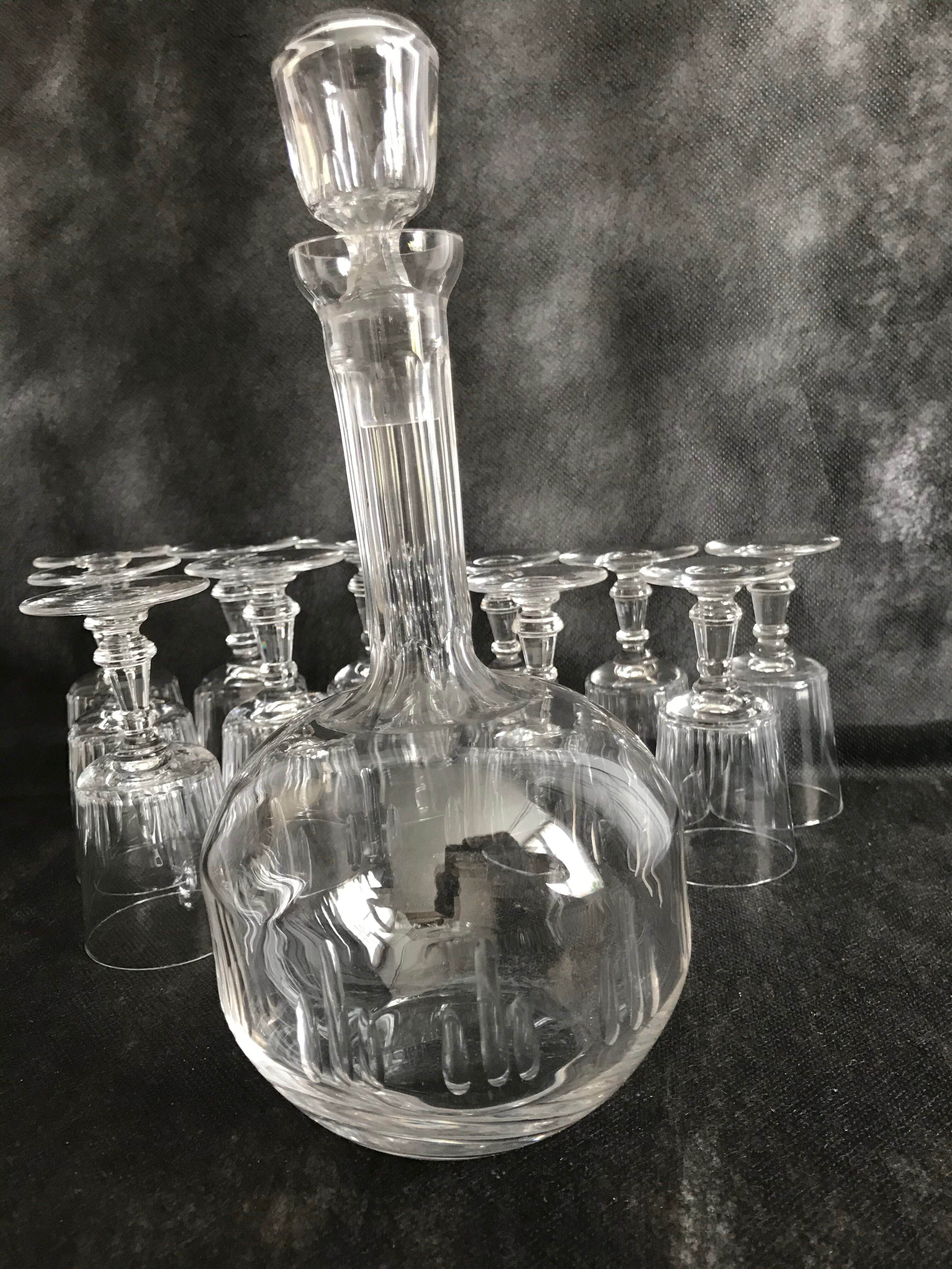 11 glasses and 1 wine carafe