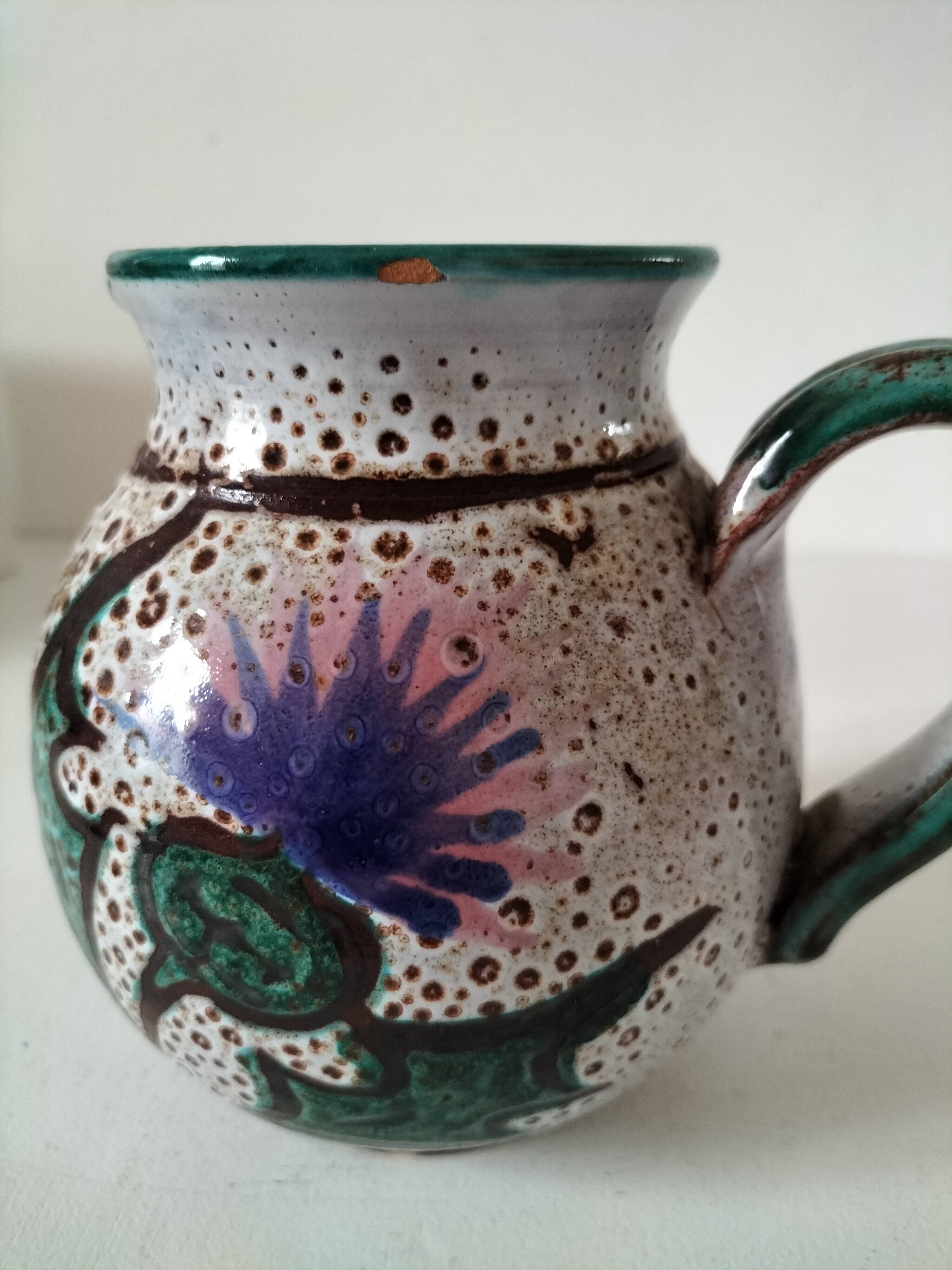Pitcher with thistle motif by André Georges Pougues les Eaux