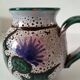Pitcher with thistle motif by André Georges Pougues les Eaux