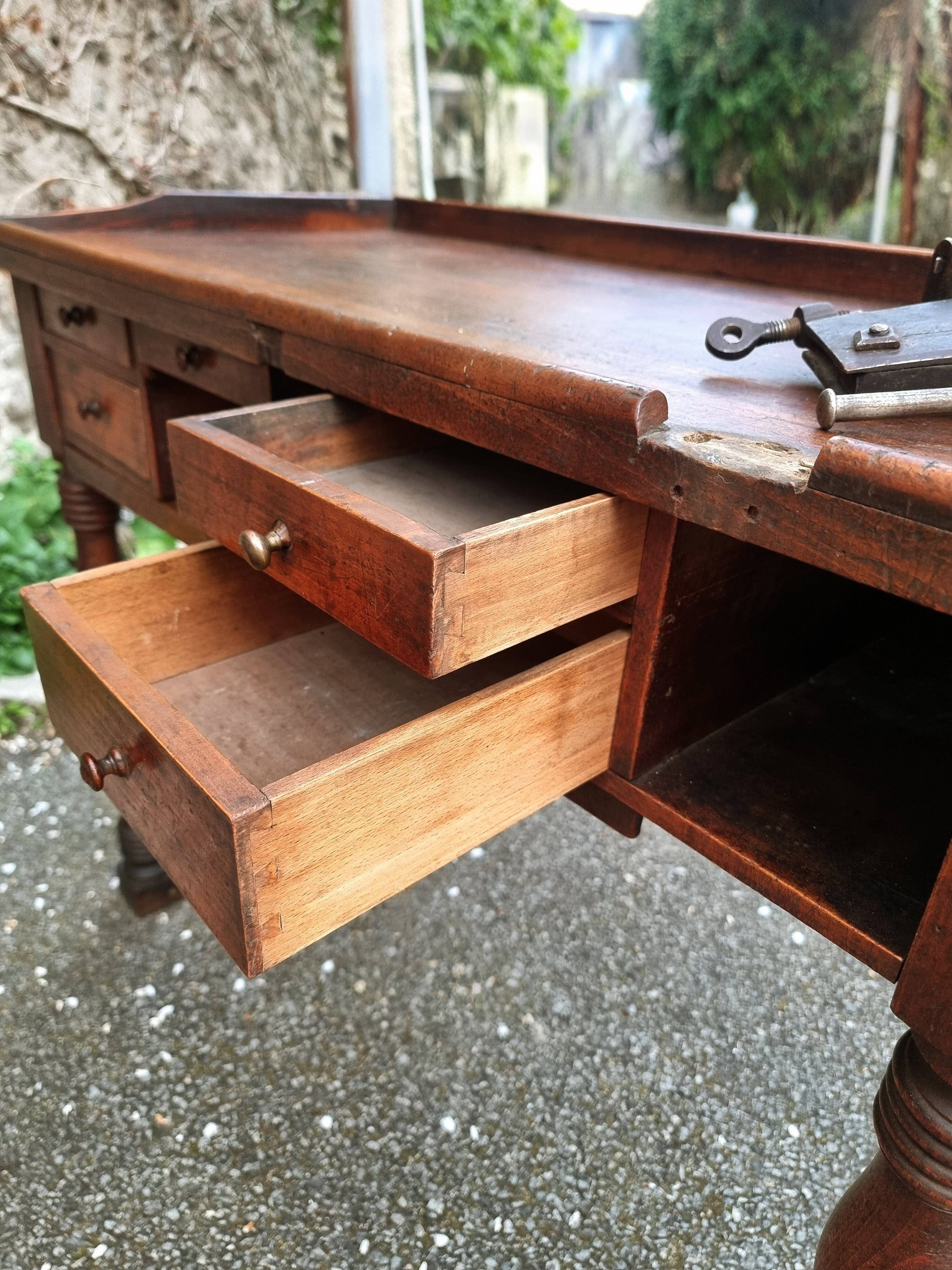 French antique watchmaker's bench – Table with drawers, vice, and original sliding leather surface – circa 1900