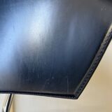 Set of four Italian black leather chairs, 1970