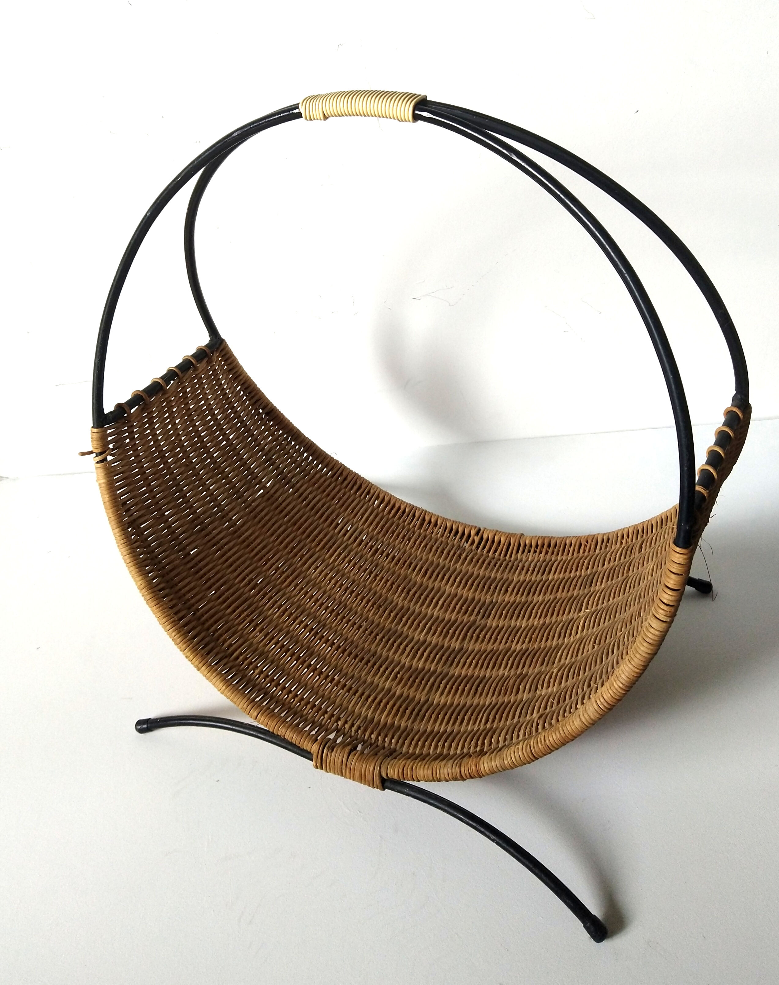 Rattan basket with logs