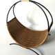 Rattan basket with logs