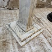 Set of 4 marble columns or pedestals.
