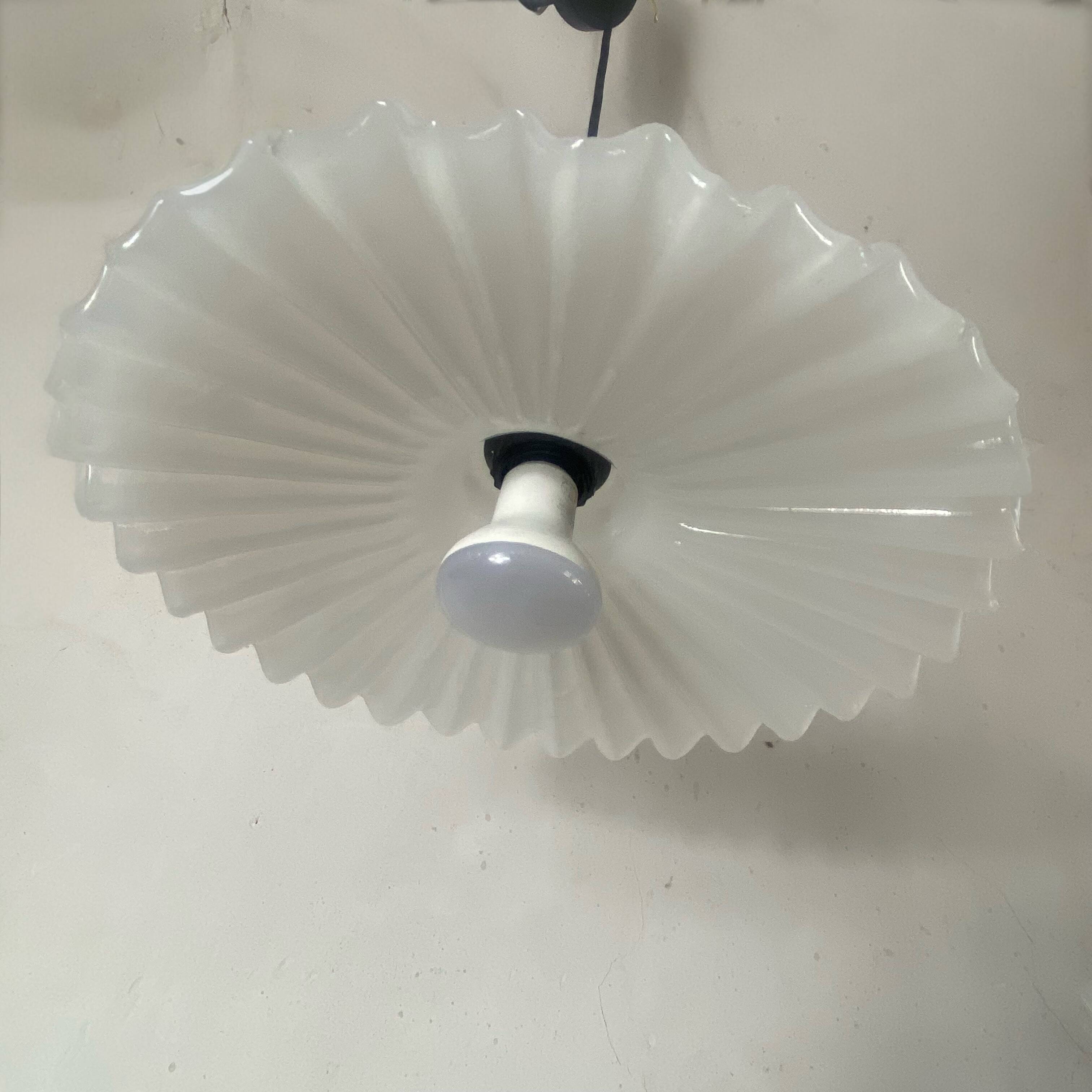 Large pair of wavy glass pendants