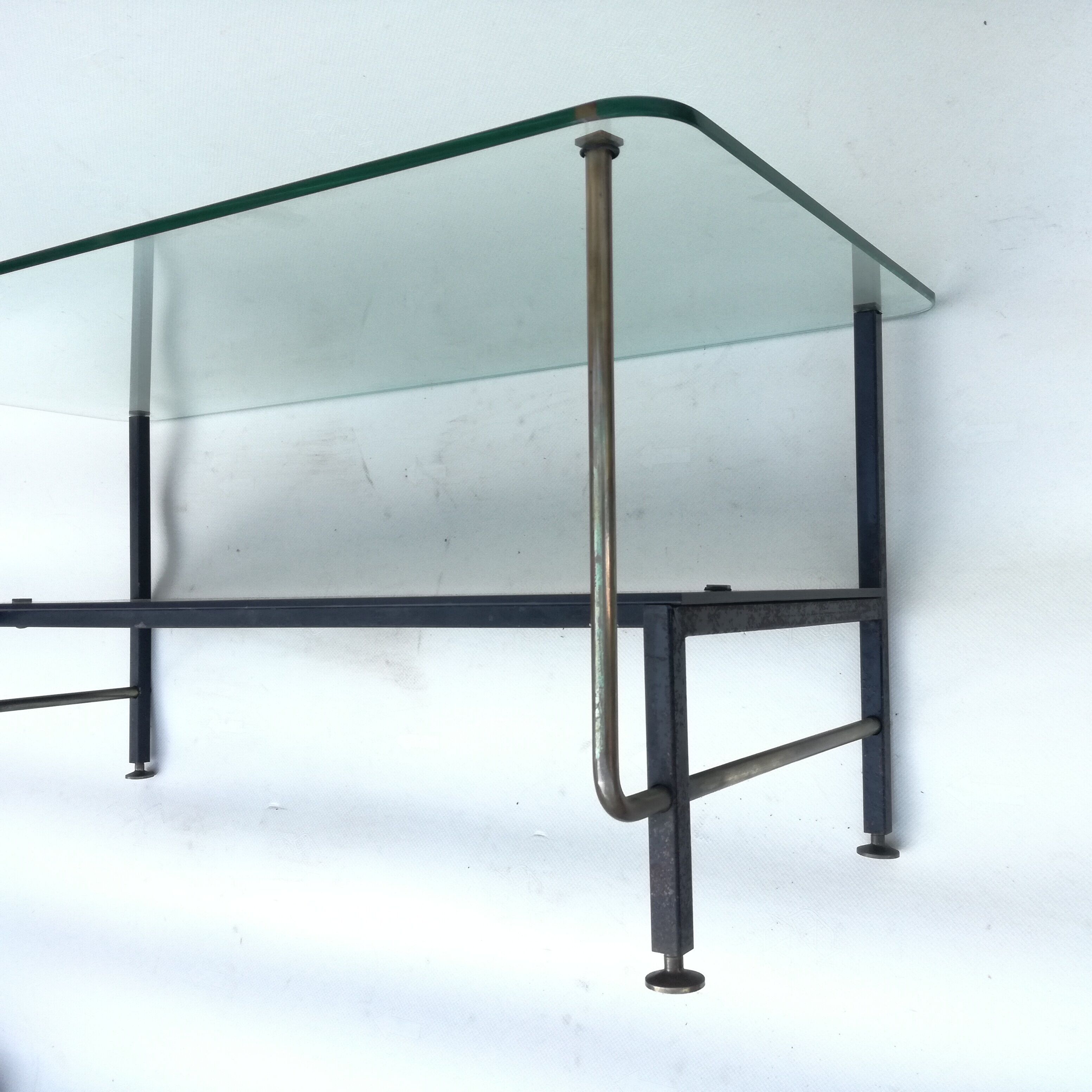 Asymmetrical glass coffee table 1950