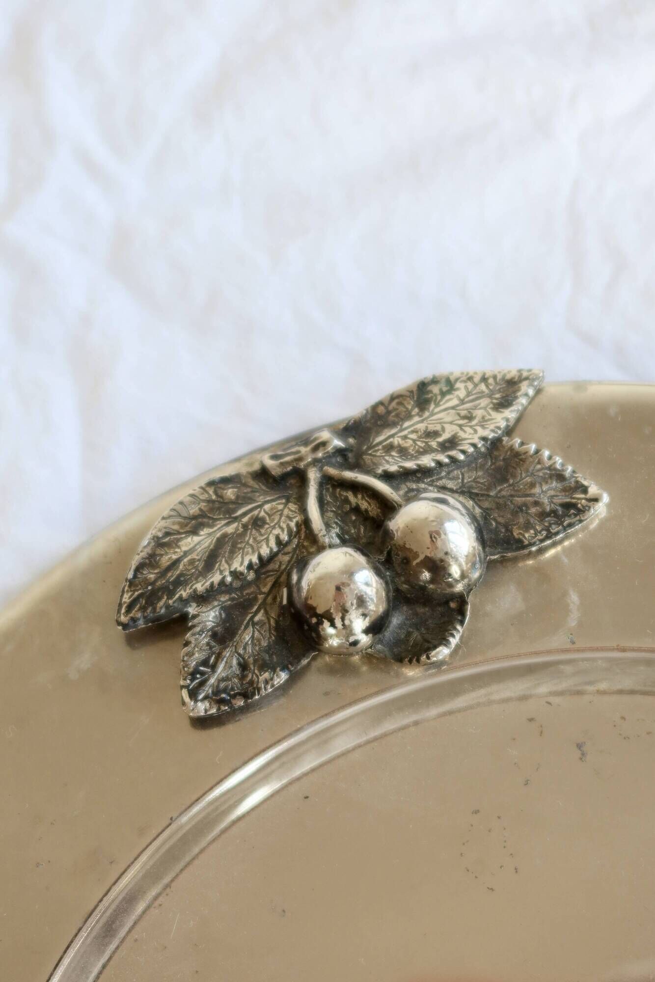 Vintage silver-plated round serving tray cherries