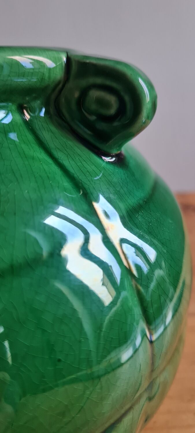 Green glazed earthenware vase