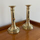 Pair of antique brass push candlesticks