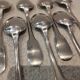 11 silver-plated dessert spoons by Christofle, Cluny pattern, striped