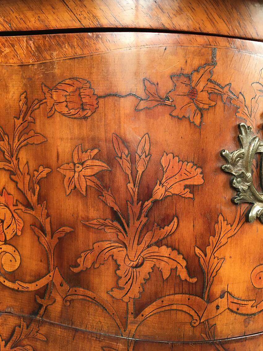 Louis XV style chest of drawers, richly inlaid, animated front and side. 19th century