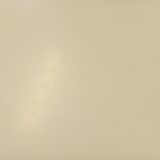 Vintage Eames round table for Vitra in white melamine, wood, and metal.