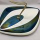Verceram France's iridescent black and white vintage cheese platter