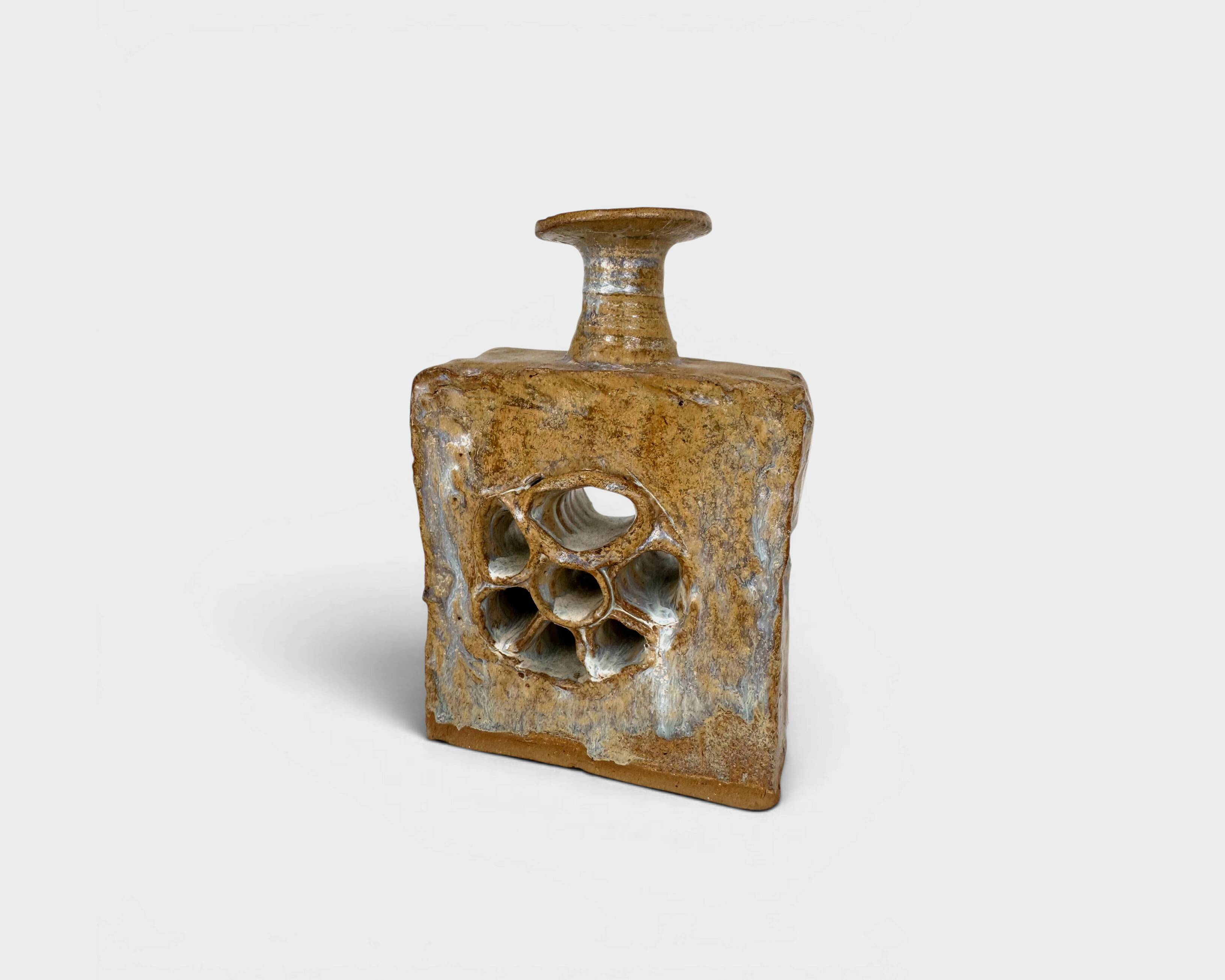 Brutalist stoneware vase with openwork decoration, Denmark, 1970.