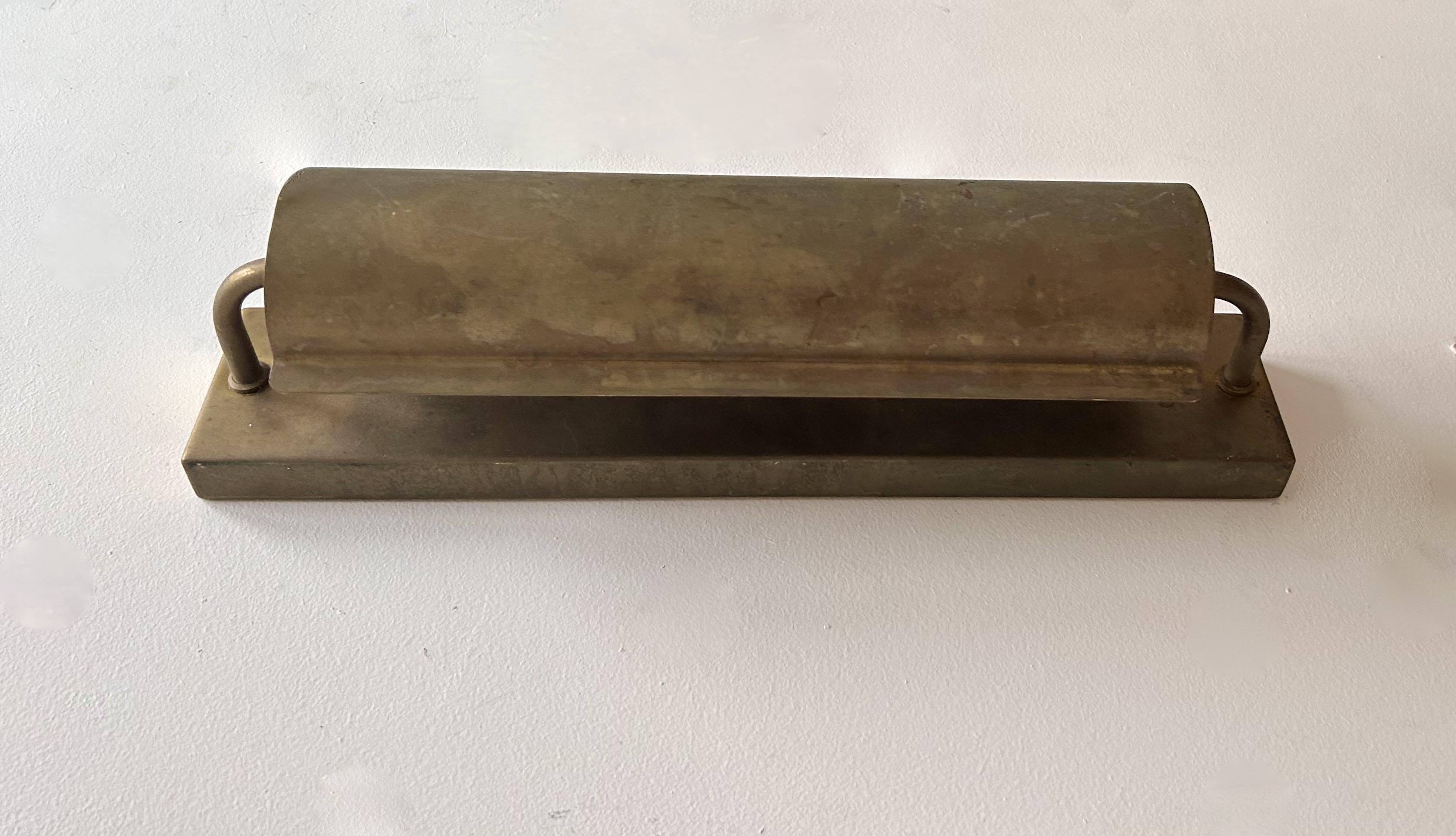 Modernist solid brass wall light, France 1940