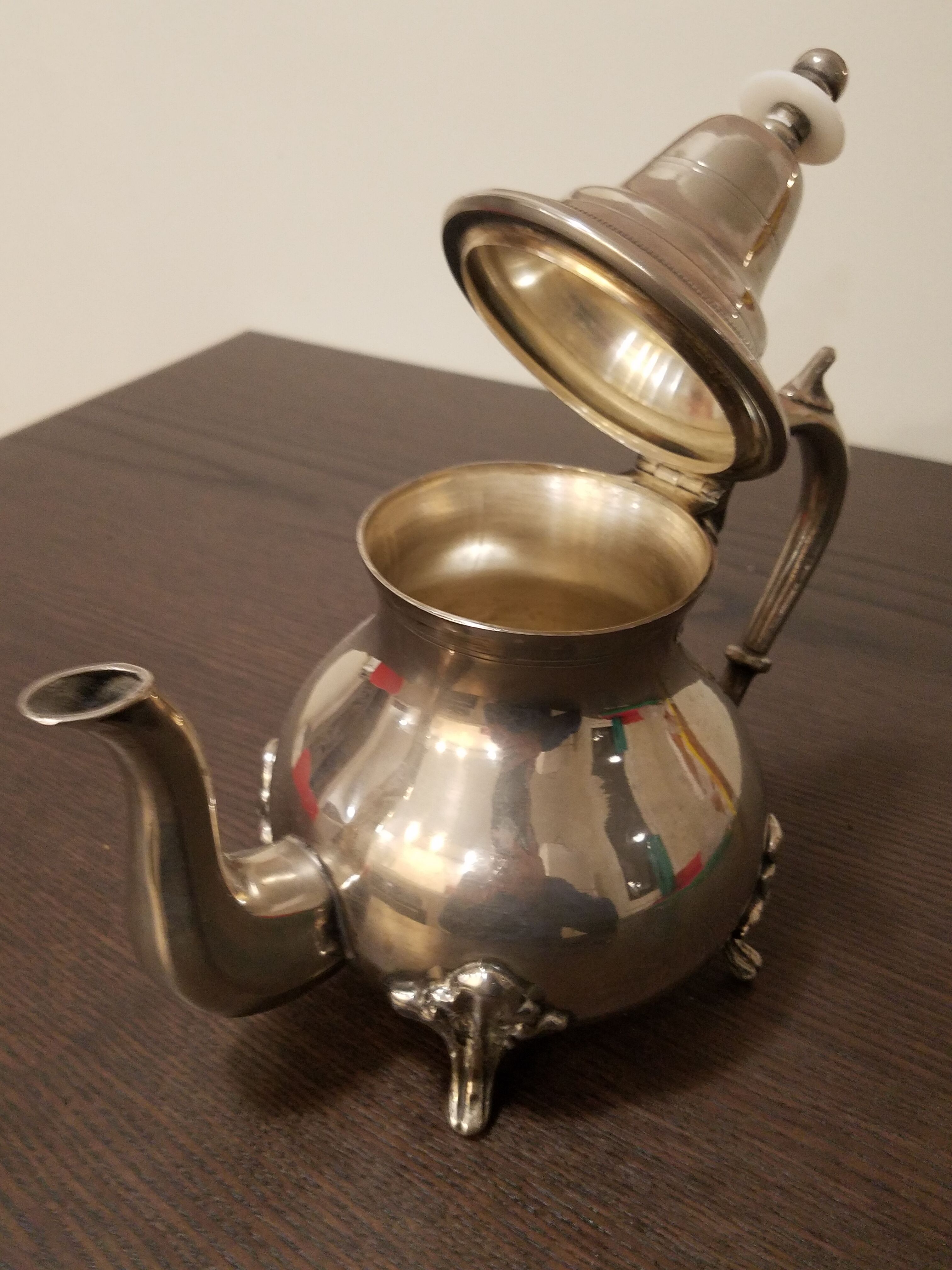 Oriental teapot in silver metal