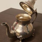 Oriental teapot in silver metal