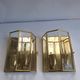 Pair of Italian gold-plated brass wall sconces with beveled glass