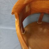 Fauteuil de bureau garni de cuir début XIXe siècle,