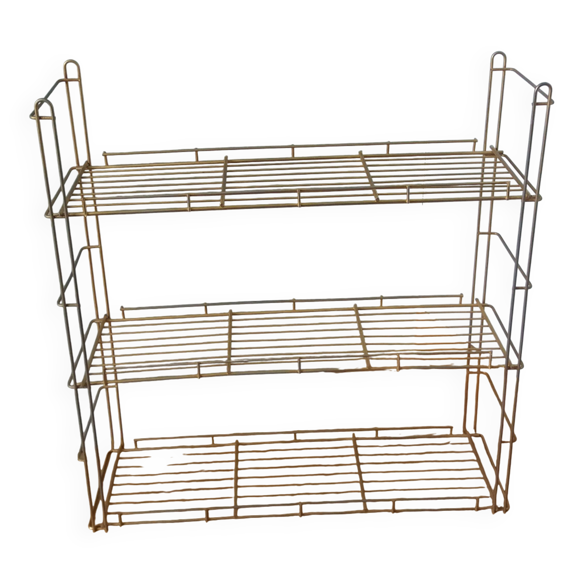 String shelf in golden metal wires