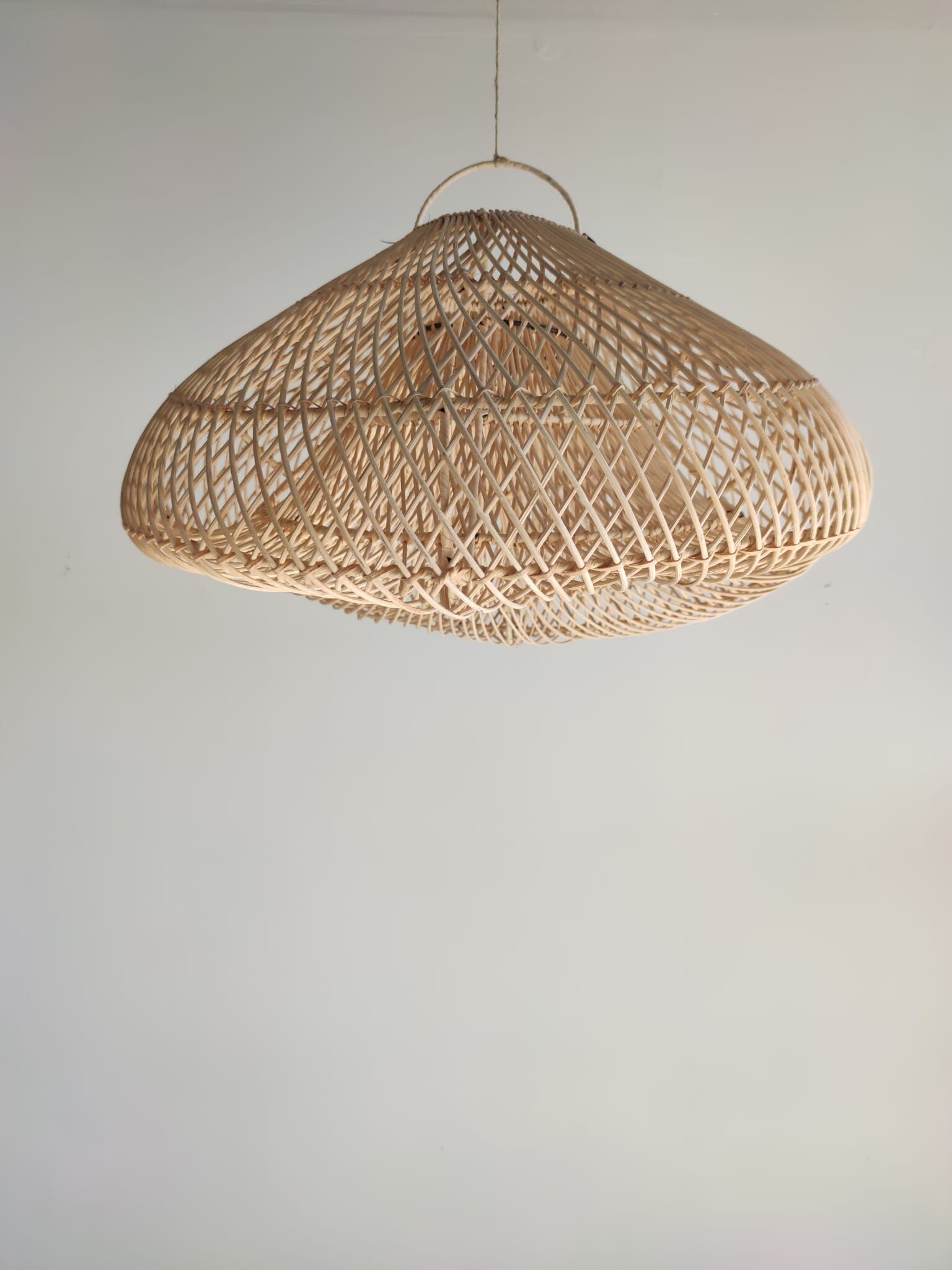 Small rattan lampshade in the shape of a braided hat