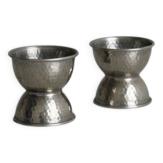 Pair of shaped metal egg cups