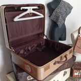1930s Oshkosh suitcase with bakelite hangers
