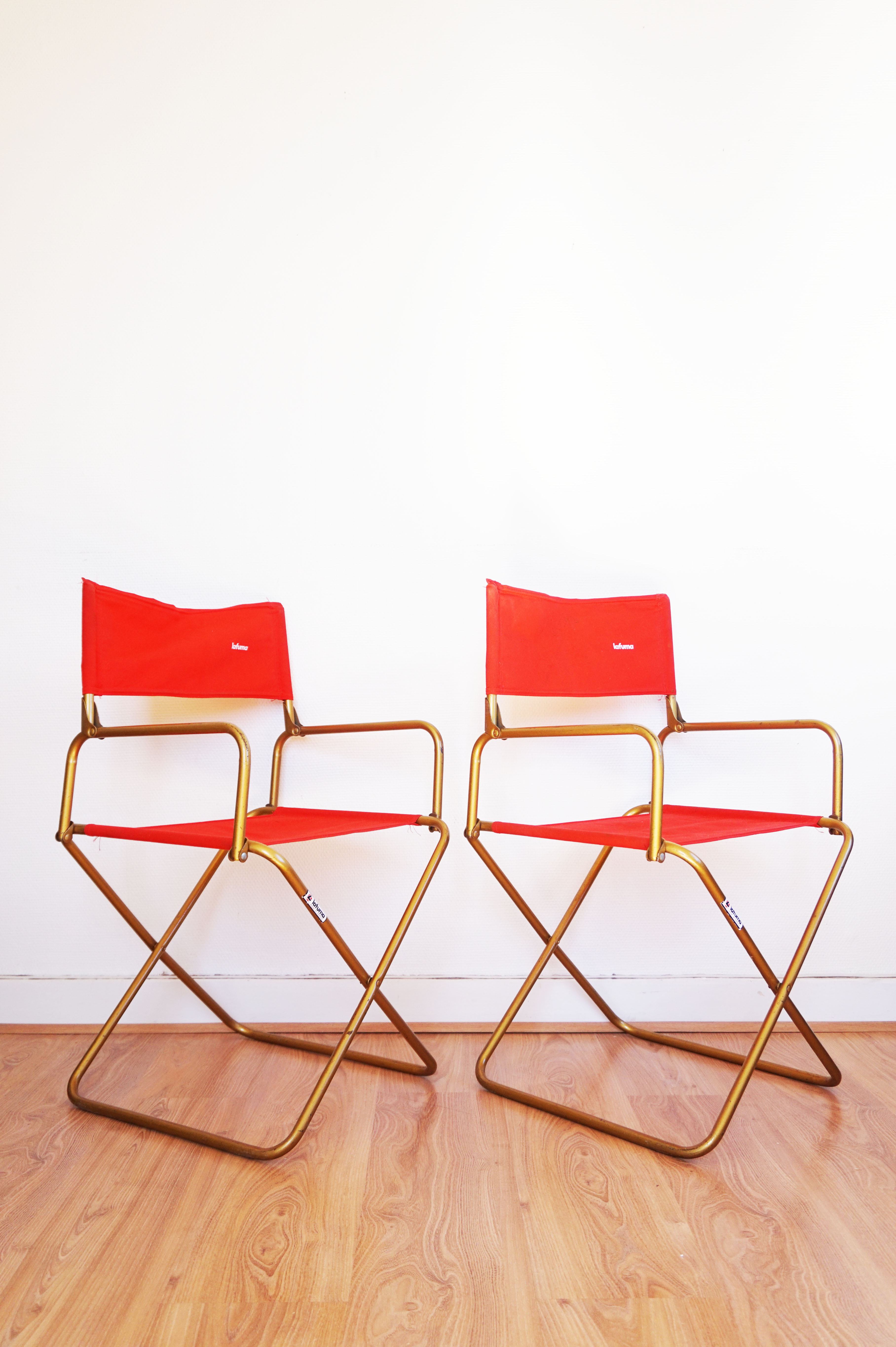 Red vintage pair of lafuma folding chairs