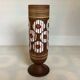 Matte and glazed vase with white and red circles, W Germany.