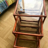 Trundle tables in honey-colored rattan