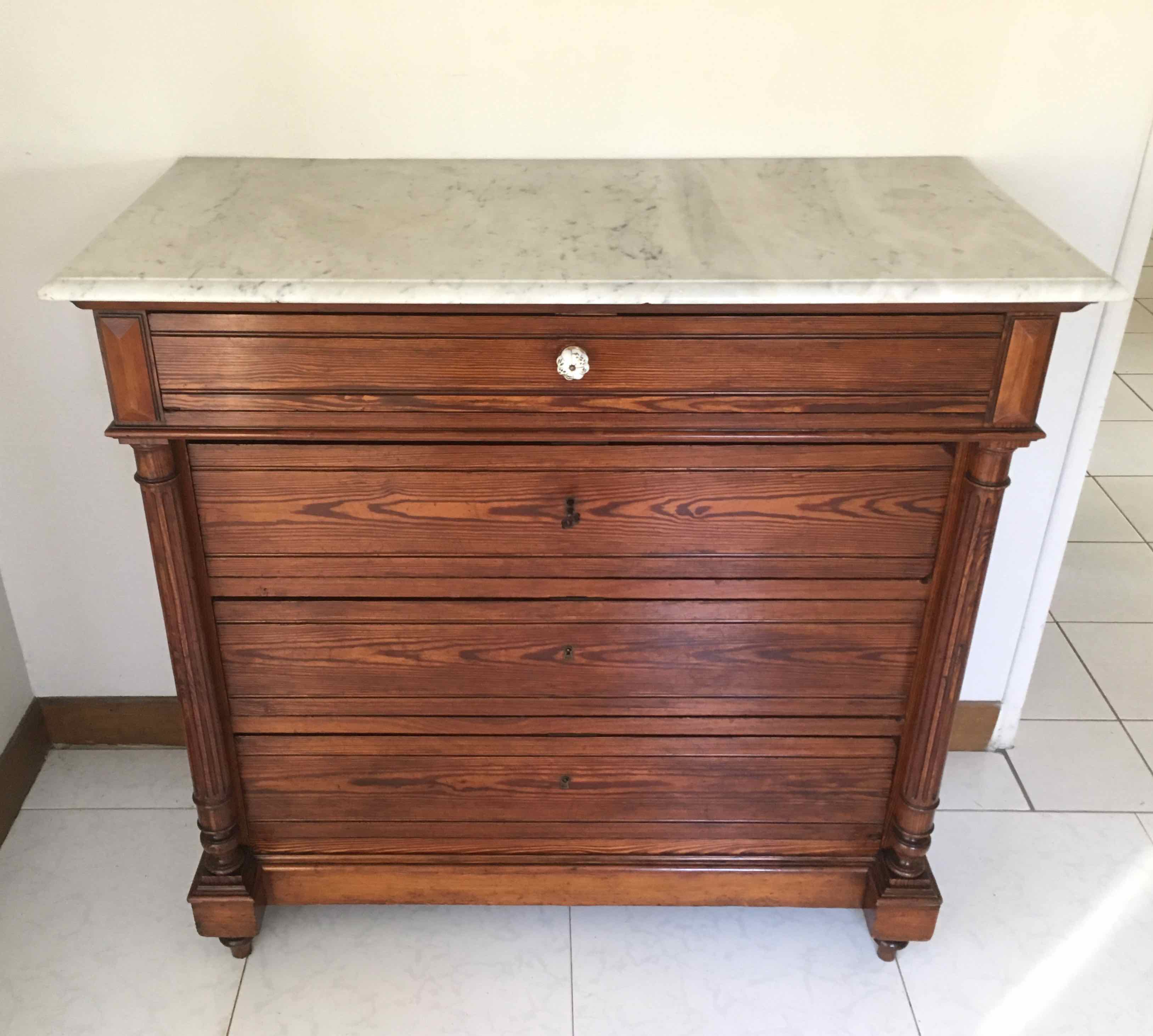 Marble and pitchpin chest of drawers