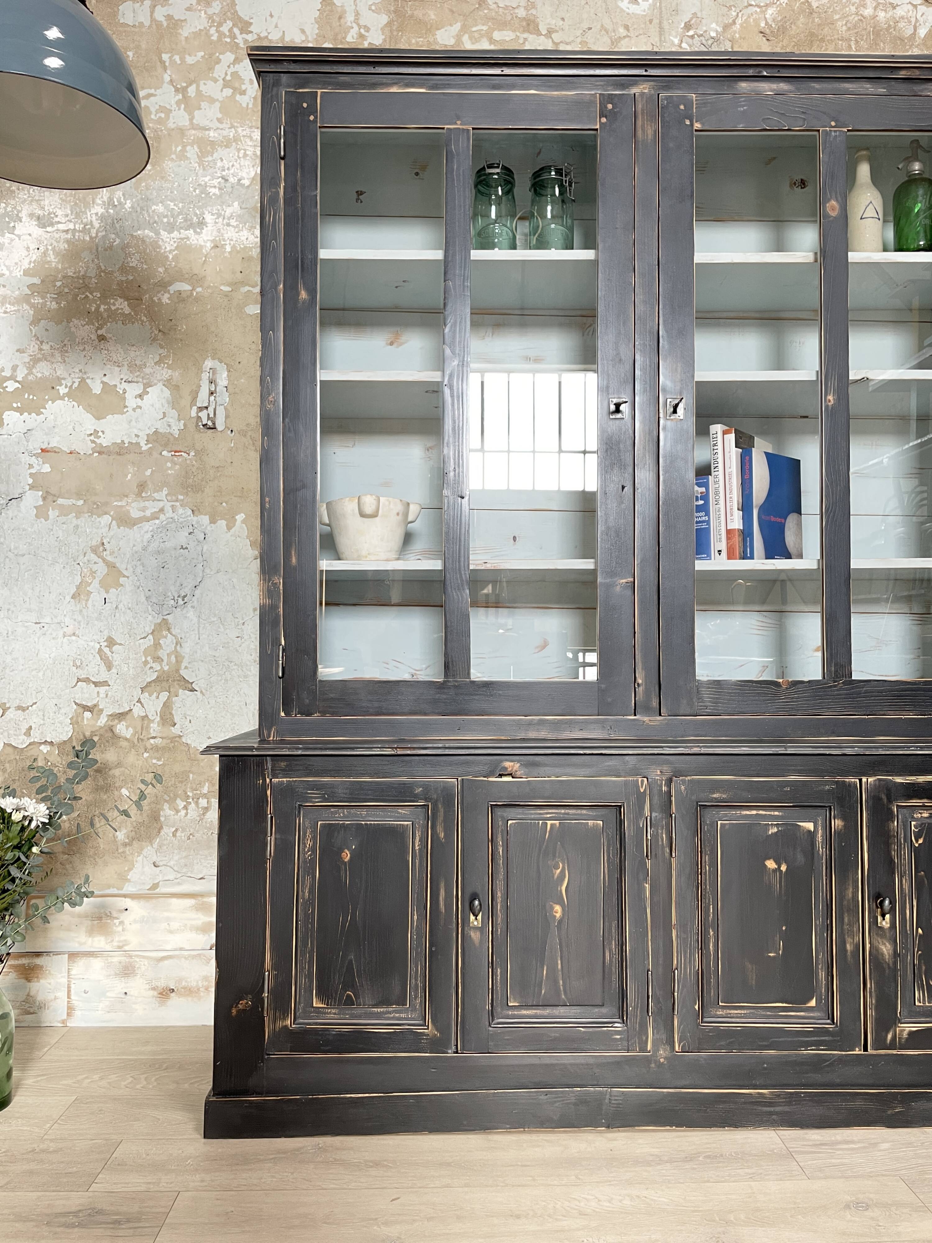 Display cabinet in patinated wood