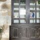 Display cabinet in patinated wood