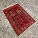 Vintage Afghan hand-knotted prayer rug with Islamic patterns.