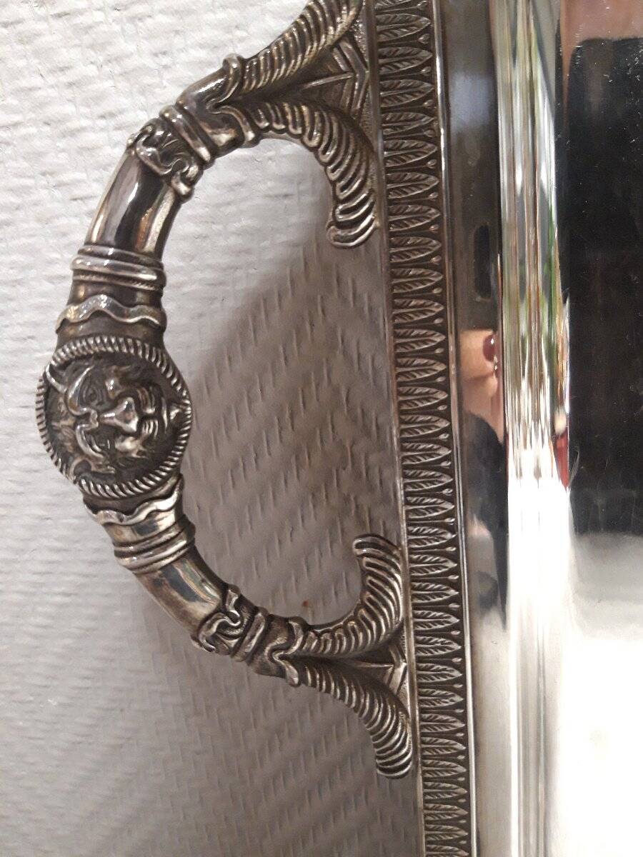 Silver-plated service tray with handles, neoclassical decoration.