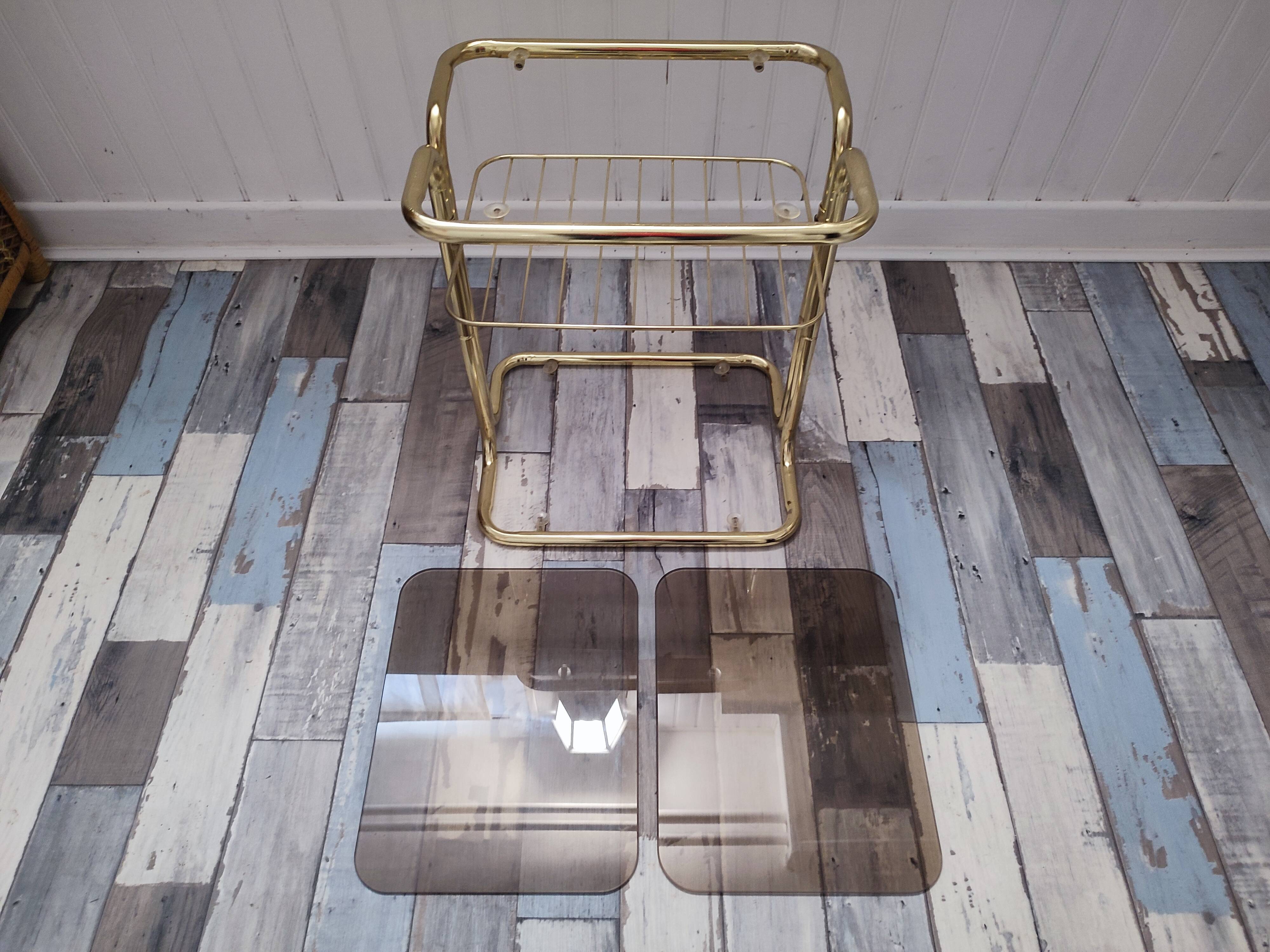 Pair of vintage smoked glass and brass bedside tables