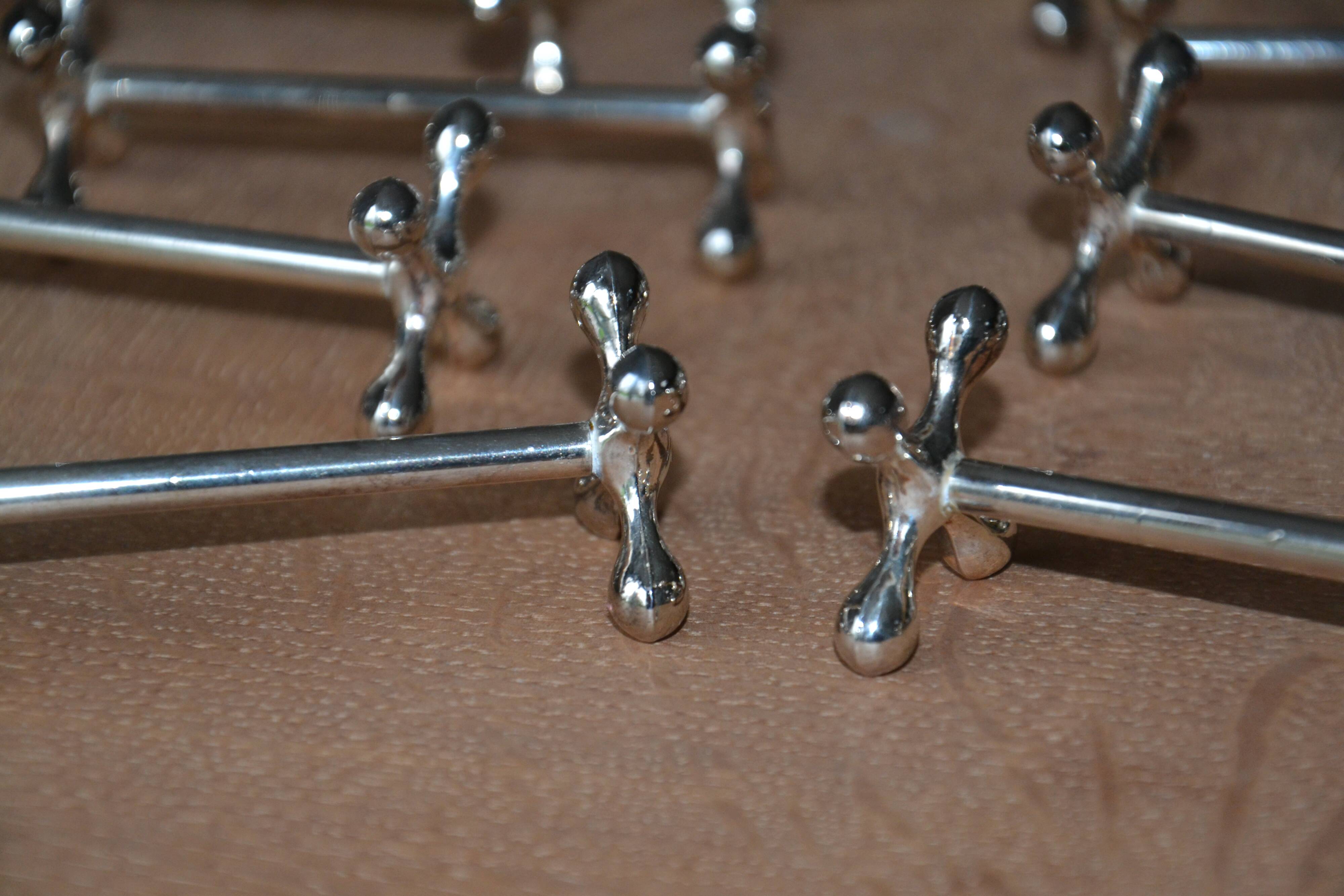 12 silver metal knife holders